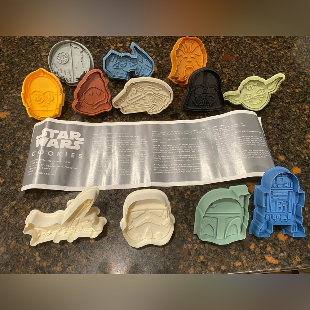 12 pieces Williams Sonoma Star Wars cookie press cutters.